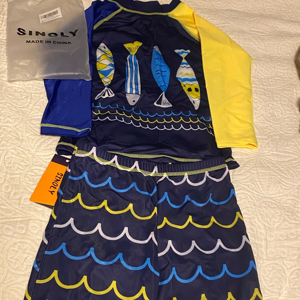 Brand new bathing suit set size 7